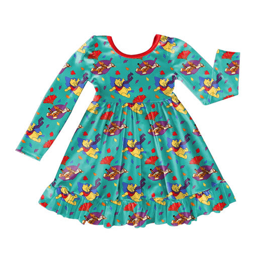 Children's dress with cartoon character pattern on a white background