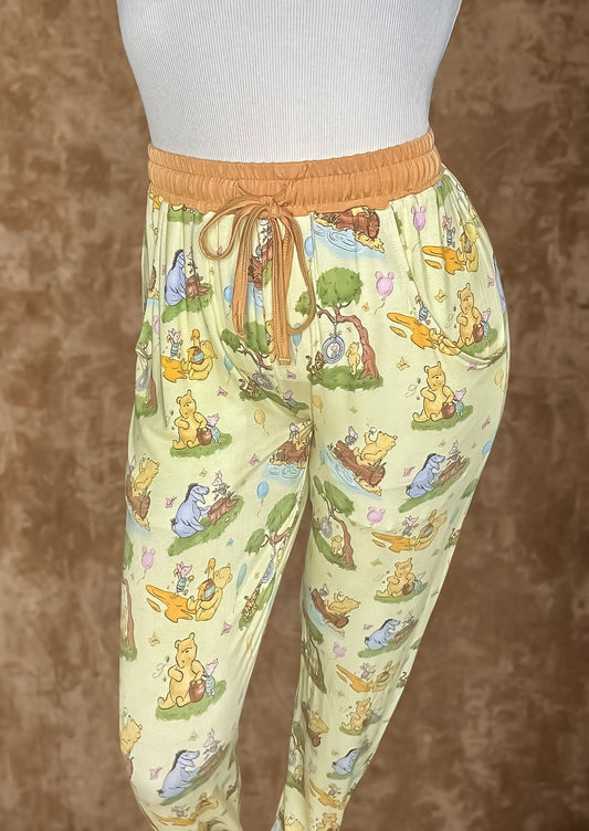 Woodland Friends Bamboo Adult Joggers with playful animal print, showing drawstring and pockets.