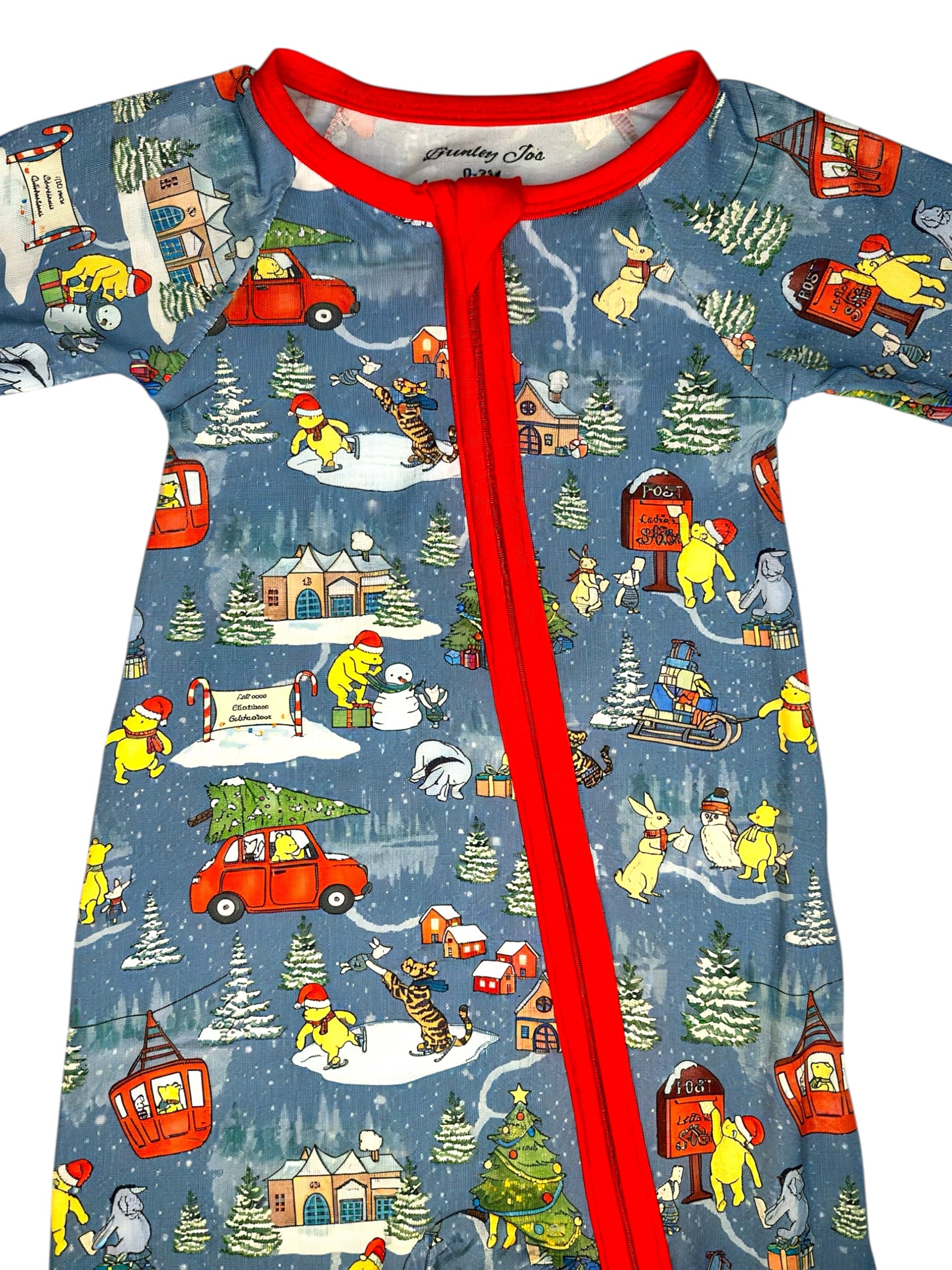 Children's pajama set with winter scene print and red trim