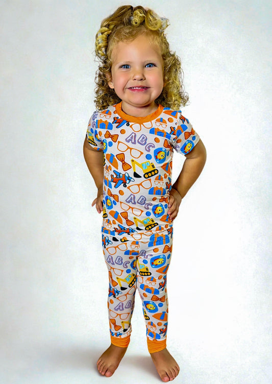 Playtime Adventures Bamboo two-piece pajama set with colorful design, featuring 95% luxury viscose bamboo and 5% spandex.
