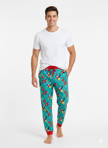 Man wearing a white t-shirt and colorful pajama pants on a white background